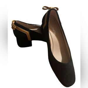 Cinack size 7.5 block heel black with orange/ yellow bow details.